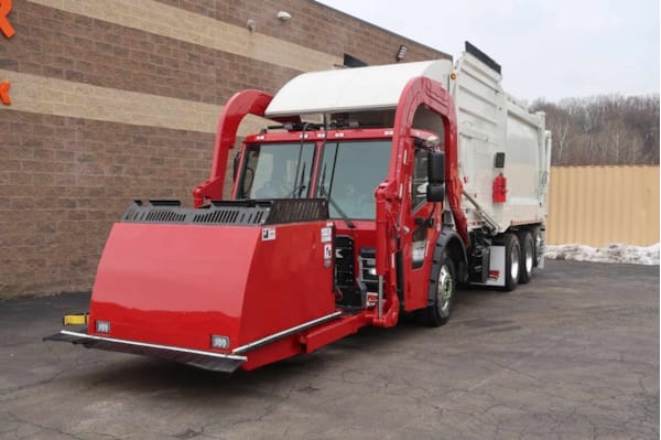 residential front loader garbage truck front left view